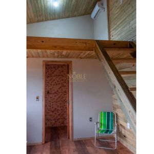 Casa com 1800m², 4 dormitórios, 3 vagas no bairro Centro em Praia Grande para Comprar