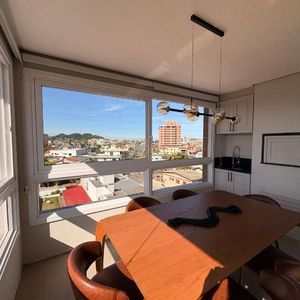 Apartamento com 72m², 2 dormitórios, 1 suíte, 1 vaga no Topazio em Torres para Comprar