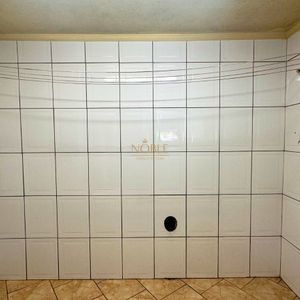 Casa com 420m², 5 dormitórios, 3 suítes, 1 vaga no bairro Centro em Torres para Comprar