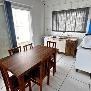 Casa com 125m², 3 dormitórios, 2 vagas no bairro Loteamento Caravelle em Passo de Torres para Comprar