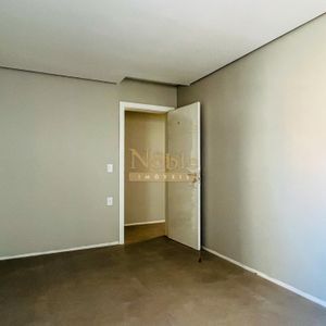 Apartamento com 119m², 3 dormitórios, 1 suíte, 2 vagas no Titanium em Torres para Comprar