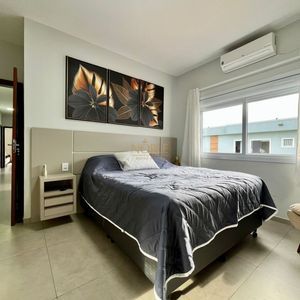 Casa com 670m², 5 dormitórios, 3 suítes, 3 vagas no bairro Bellatorres em Passo de Torres para Comprar