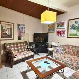 Sobrado com 199m², 3 dormitórios, 3 suítes, 2 vagas no bairro Praia da Cal em Torres para Comprar