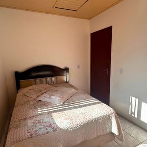 Casa, 6 dormitórios, 2 vagas no bairro Praia da Cal em Torres para Comprar