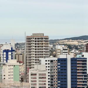 Apartamento com 52m², 1 dormitório, 1 suíte, 1 vaga no Punta Del Sole em Torres para Comprar