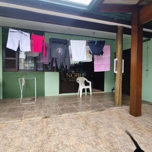 Casa, 6 dormitórios, 2 suítes, 3 vagas no bairro Getúlio Vargas em Torres para Comprar