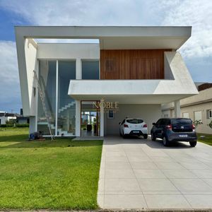 Casa de Condomínio com 280m², 4 dormitórios, 4 suítes, 2 vagas no Reserva das Águas em Torres para Comprar