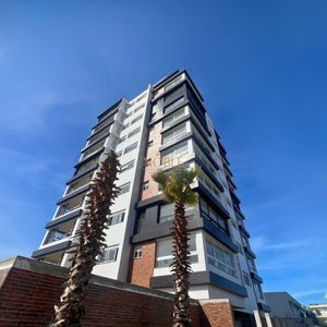 Apartamento com 70m², 2 dormitórios, 1 suíte, 1 vaga no Topazio em Torres para Comprar