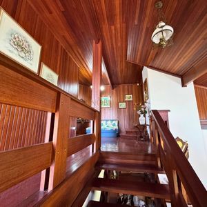 Casa com 220m², 4 dormitórios, 4 suítes, 2 vagas no bairro Igra Norte em Torres para Comprar