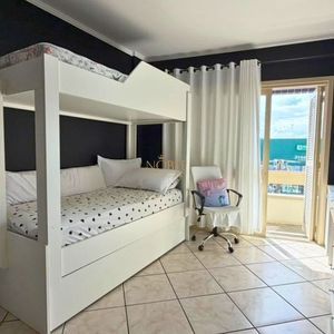 Apartamento com 88m², 2 dormitórios, 1 suíte, 1 vaga no Residencial Centenario em Torres para Comprar