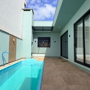 Casa, 3 dormitórios, 1 suíte, 1 vaga no bairro Morada das Palmeiras em Torres para Comprar