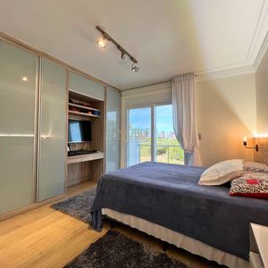 Casa com 600m², 4 dormitórios, 1 suíte, 4 vagas no bairro Igra Norte em Torres para Comprar