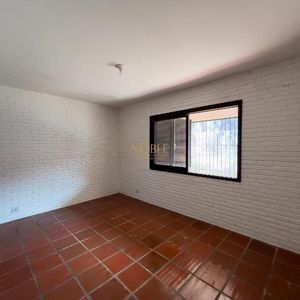 Casa com 100m², 2 dormitórios, 3 vagas no bairro Praia da Cal em Torres para Comprar