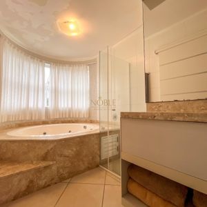 Apartamento com 232m², 4 dormitórios, 4 suítes, 2 vagas no Estevanell em Torres para Comprar