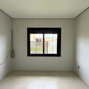 Casa com 284m², 4 dormitórios, 1 suíte, 2 vagas no bairro Igra Sul em Torres para Comprar