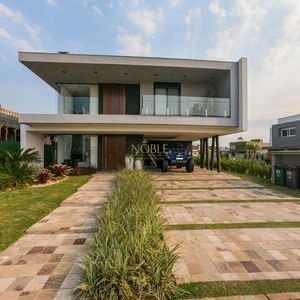 Casa de Condomínio com 373m², 3 dormitórios, 3 suítes, 2 vagas no Reserva das Águas em Torres para Comprar