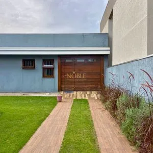 Casa com 148m², 3 dormitórios, 1 suíte, 2 vagas no bairro Morada das Palmeiras em Torres para Comprar