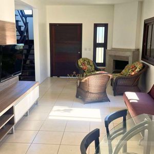 Casa com 240m², 4 dormitórios, 2 suítes, 2 vagas no bairro Praia Paraíso em Torres para Comprar