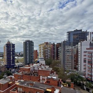 Apartamento com 120m², 4 dormitórios, 1 suíte, 2 vagas no Michelângelo em Torres para Comprar