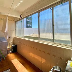 Apartamento com 82m², 2 dormitórios, 1 vaga no Edifício Dona Emília em Torres para Comprar