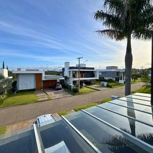 Casa de Condomínio com 187m², 3 dormitórios, 1 suíte, 4 vagas no Reserva das Águas em Torres para Comprar