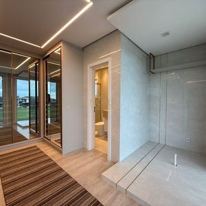 Casa de Condomínio com 359m², 4 dormitórios, 4 suítes, 2 vagas no Reserva das Águas em Torres para Comprar