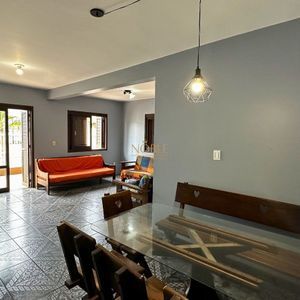 Apartamento com 94m², 3 dormitórios, 1 suíte, 2 vagas no Edifício Saron em Torres para Comprar