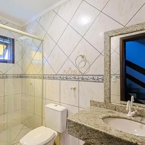 Casa, 4 dormitórios, 1 suíte, 2 vagas no bairro Itapeva Norte em Torres para Comprar