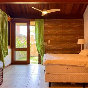 Casa, 4 dormitórios, 2 suítes, 3 vagas no bairro Praia Grande em Torres para Comprar