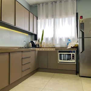 Geminado com 103m², 3 dormitórios, 1 suíte, 2 vagas no bairro Morada das Palmeiras em Torres para Comprar