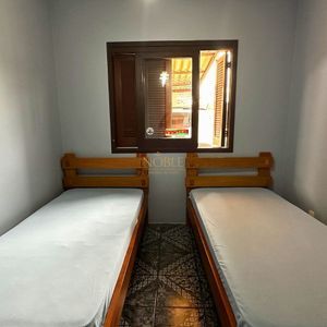 Apartamento com 94m², 3 dormitórios, 1 suíte, 2 vagas no Edifício Saron em Torres para Comprar