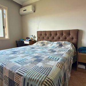 Casa com 209m², 3 dormitórios, 1 suíte, 2 vagas no bairro Igra em Torres para Comprar