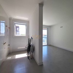 Apartamento com 74m², 2 dormitórios, 1 suíte, 1 vaga no Residencial Acrópole em Torres para Comprar