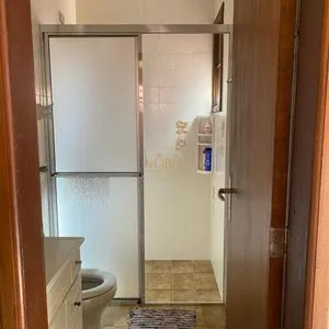 Casa com 247m², 5 dormitórios, 3 suítes, 3 vagas no bairro Praia Grande em Torres para Comprar