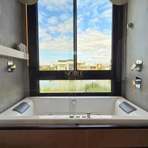 Casa de Condomínio com 277m², 3 dormitórios, 3 suítes, 2 vagas no Reserva das Águas em Torres para Comprar