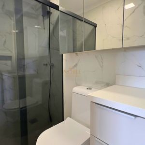 Apartamento, 2 dormitórios, 1 suíte, 1 vaga no Towers Trade Center em Torres para Comprar