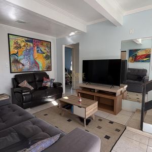 Casa, 3 dormitórios, 1 suíte, 1 vaga no bairro Igra Sul em Torres para Comprar
