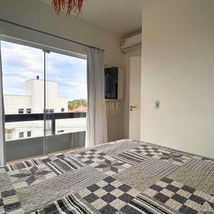 Casa com 170m², 2 dormitórios, 3 vagas no bairro Centenário em Torres para Comprar