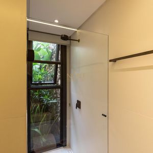 Casa de Condomínio com 244m², 4 dormitórios, 4 suítes, 2 vagas no Condomínio Ilhas Park em Torres para Comprar