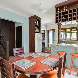 Casa, 4 dormitórios, 1 suíte, 2 vagas no bairro Itapeva Norte em Torres para Comprar