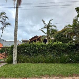 Casa com 200m², 3 dormitórios, 1 suíte, 2 vagas no bairro Praia Grande em Torres para Comprar