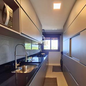 Apartamento com 106m², 3 dormitórios, 1 suíte, 2 vagas no Essenza em Torres para Comprar