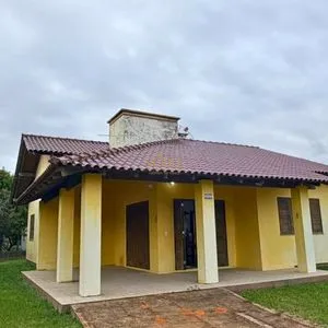 Casa, 3 dormitórios, 3 vagas no bairro Praia Itapeva em Torres para Comprar