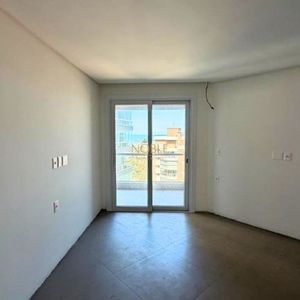 Apartamento, 2 dormitórios, 1 suíte, 2 vagas no Bella Vita em Torres para Comprar