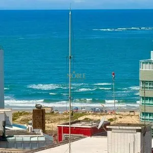Apartamento com 86m², 2 dormitórios, 2 suítes, 1 vaga no Titanium em Torres para Comprar