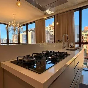 Apartamento com 103m², 3 dormitórios, 3 suítes, 2 vagas no Absoluto em Torres para Comprar