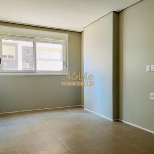 Apartamento com 119m², 3 dormitórios, 1 suíte, 2 vagas no Titanium em Torres para Comprar