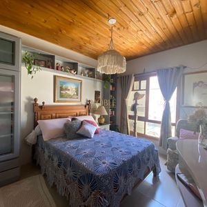 Casa com 135m², 3 dormitórios, 1 suíte, 1 vaga no bairro Bela Vista em Passo de Torres para Comprar