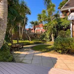 Casa, 4 dormitórios, 2 suítes, 3 vagas no bairro Praia Grande em Torres para Comprar