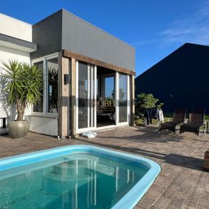 Casa de Condomínio com 260m², 3 dormitórios, 3 suítes, 4 vagas no Reserva das Águas em Torres para Comprar